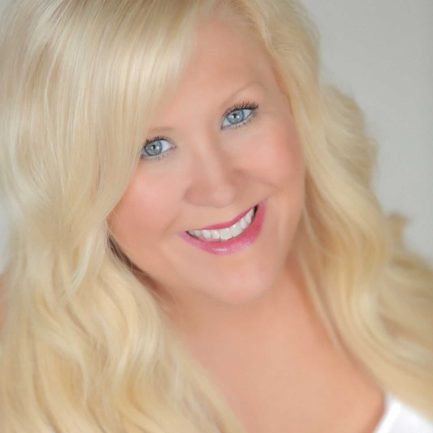 Portrait of M’chel Bauxal, a professional stylist at Abba Hair & Beauty Salon, showcasing their expertise and style.